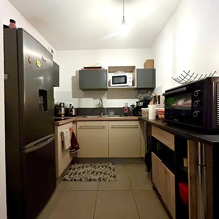 Quarto em Acomodações Particulares Privée Chez Habitant à *